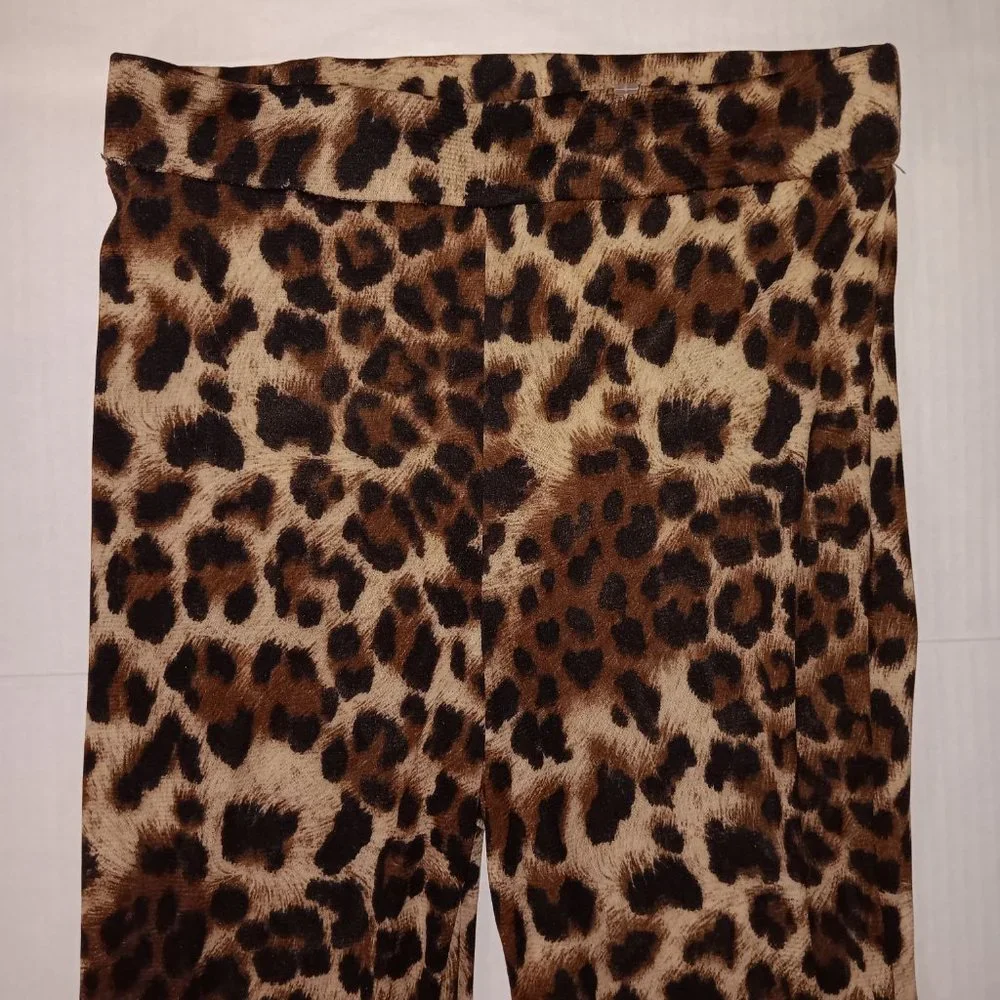 FASHION NOVA SHEER FLARE LEG ANIMAL PRINT PANTS SIZE SMALL